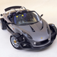 The production-spec Lotus 340R. Notice the fog lights, canards and larger rear wing, all of which were absent on the 1998 concept.